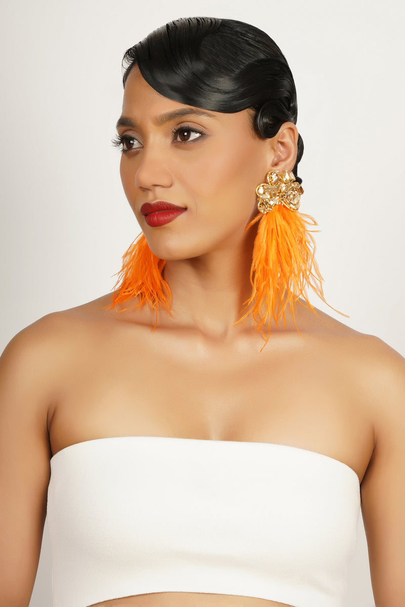 orange dress earrings Orange outfit ko ek fresh twist do with these stunning earring combos! From classic ivory to bold multicolour, heres how to mix and match for that perfect contrast. Which ones your fave? , THE