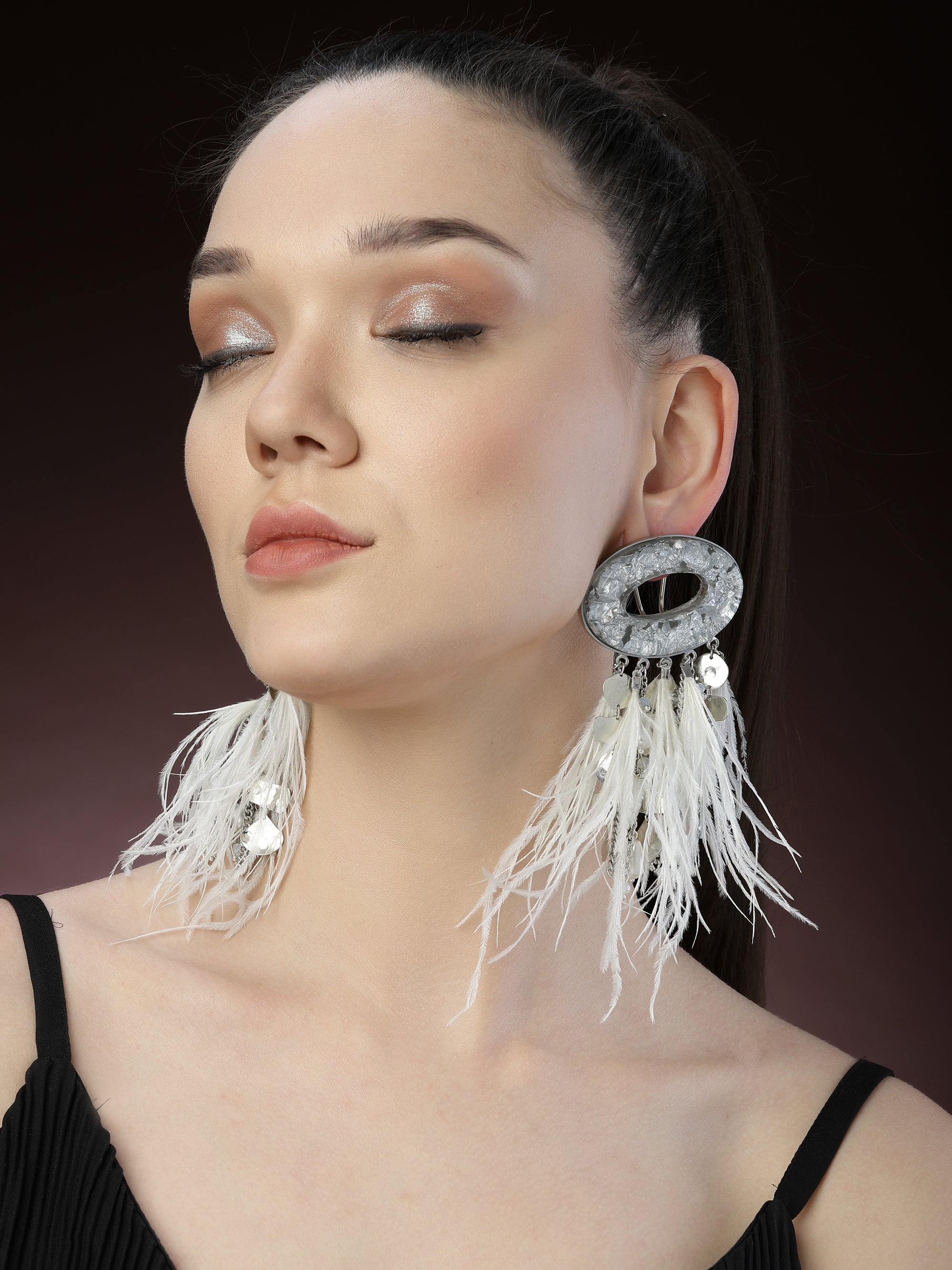 White feather earrings