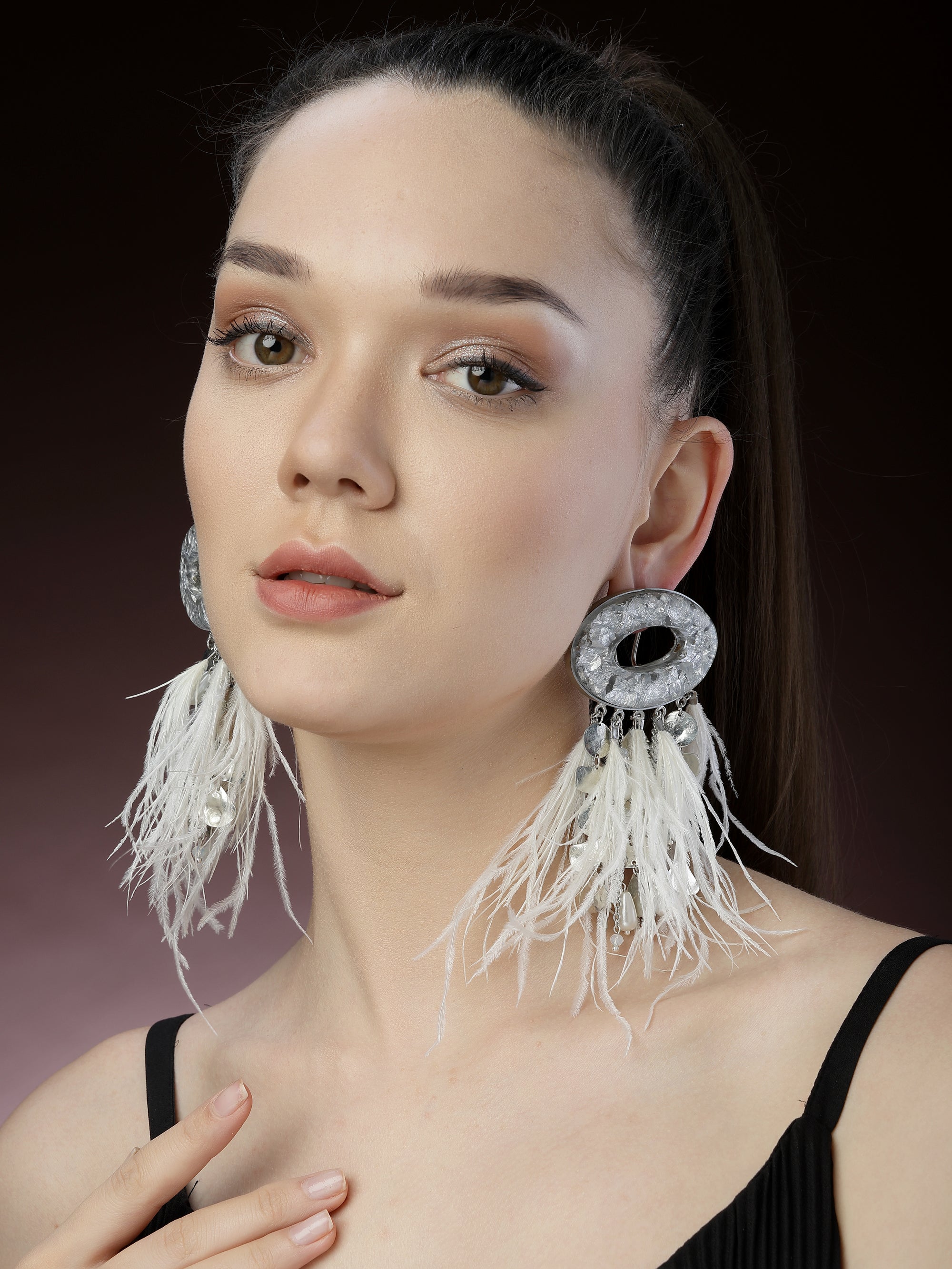 White feather earrings