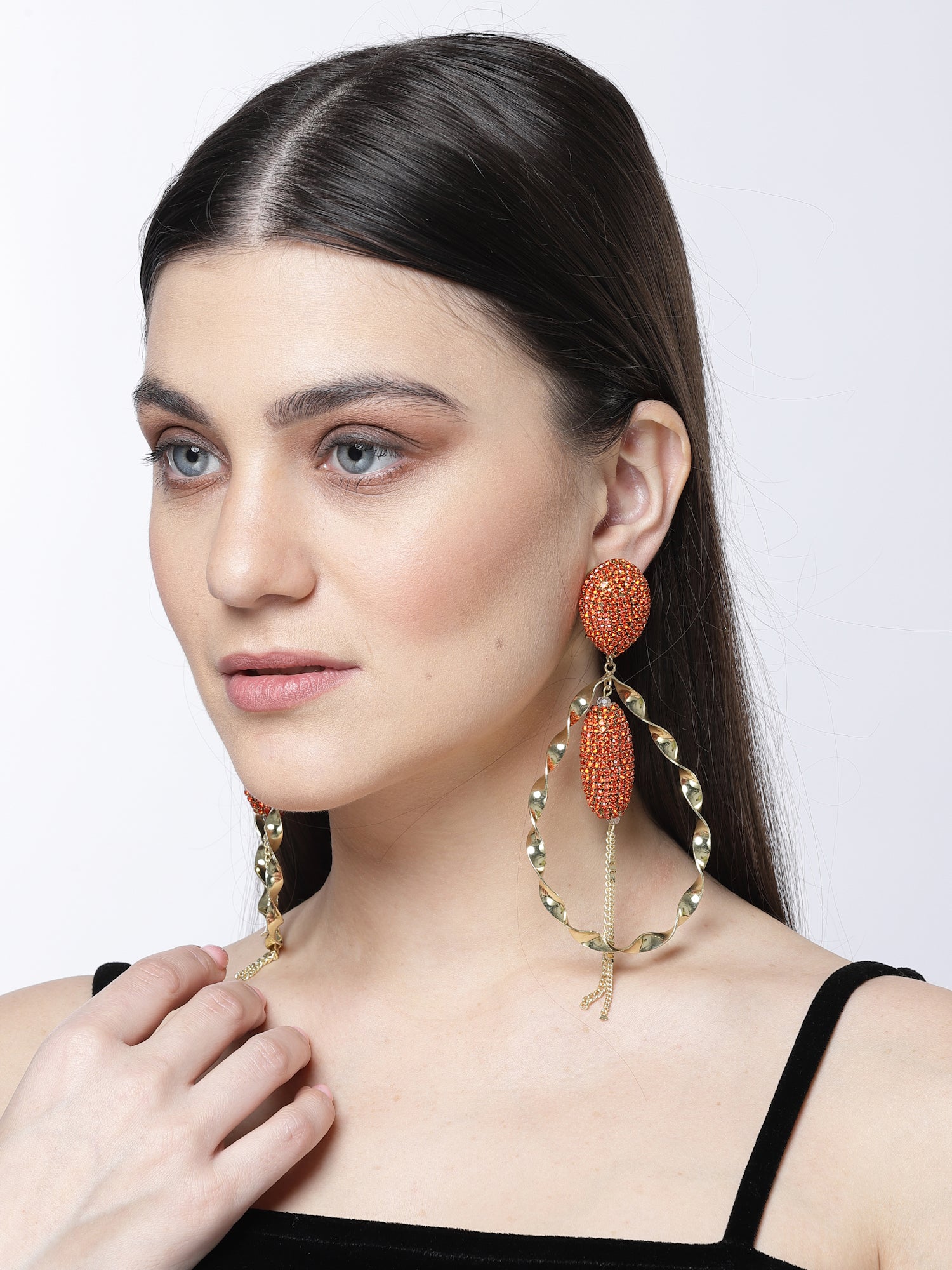 Twirled Orange Hoop Earrings